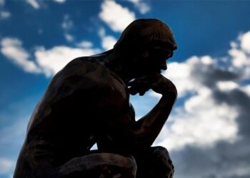 The Boundary Between Theory and Ideology